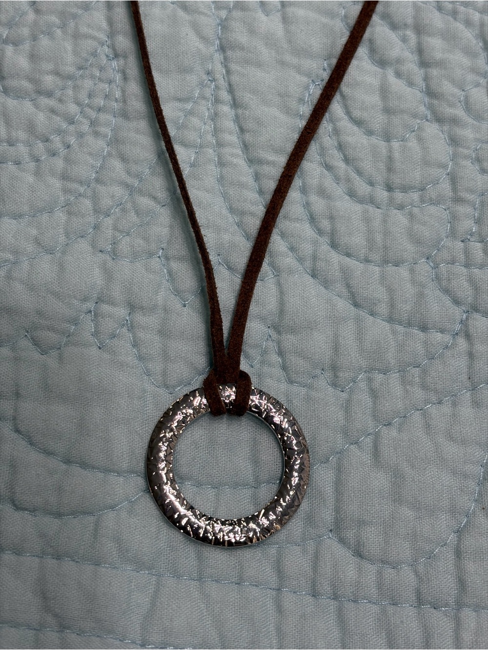 Gabriel & Company hammered design silver  circle pendant on  cord. nwot